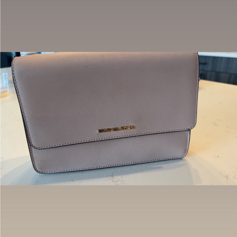 Michael Kors Tan Clutch with Flap Closure